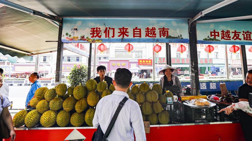 但周琦用行